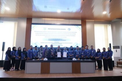 Penandatanganan kerja sama antara Bapenda Tanah Bumbu dan Kantor Pertanahan 2 1024x682 1